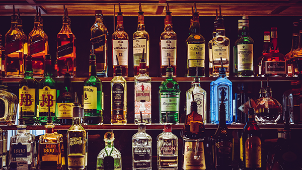 A shelf of liquor bottles.