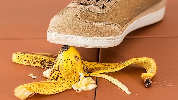 A shoe slipping on a banana peel