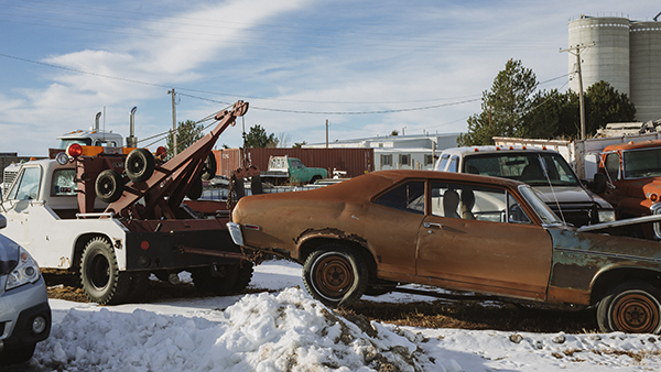 A tow truck towing a car