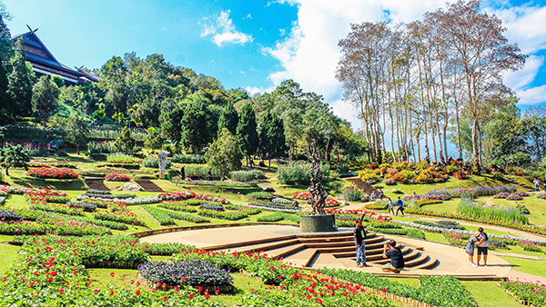 A beautiful landscape showing gardens and grassy areas.